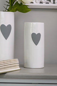 Grey heart, white vase