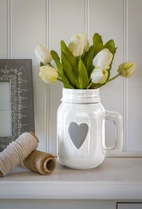 White ceramic jug with grey heart