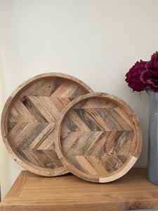 Herringbone circular wooden trays.