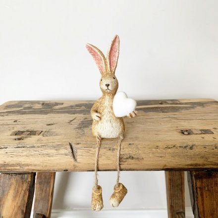 Sitting bunny with white heart